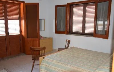 Letto o letti in una camera di Casa Magisa