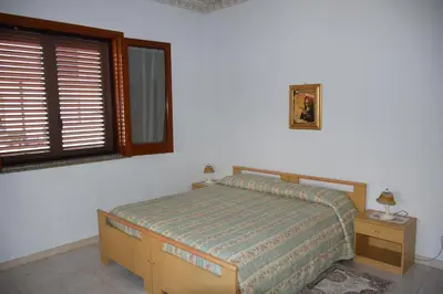 Letto o letti in una camera di Casa Magisa