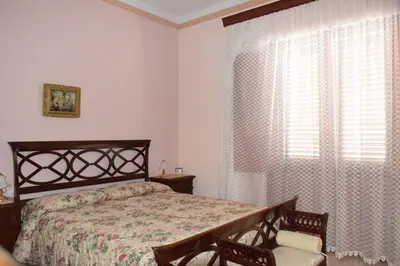Letto o letti in una camera di Casa Magisa