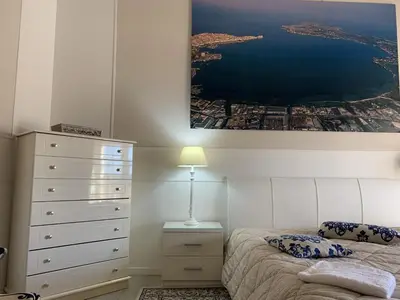 Letto o letti in una camera di Casa di Alice Luxury Hospitality - Elevator, Fast WiFi