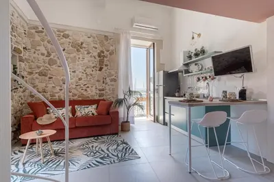 TV o dispositivi per l'intrattenimento presso La Gorgone Ortigia Suites