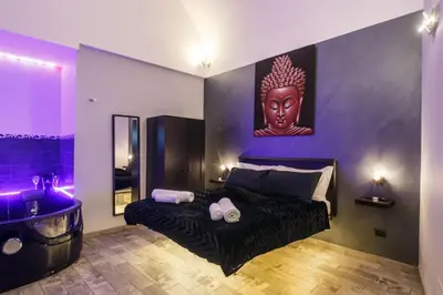 Letto o letti in una camera di Sicily Suite