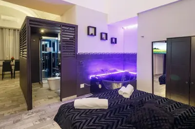 Letto o letti in una camera di Sicily Suite