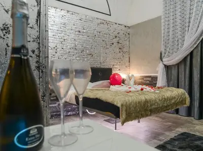 Letto o letti in una camera di Sicily Suite
