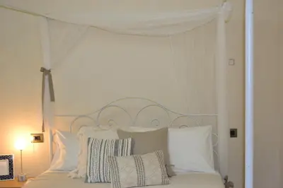 Letto o letti in una camera di Ai due Mori Apt by Addler House Ospitality
