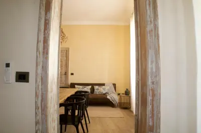 Letto o letti in una camera di Ai due Mori Apt by Addler House Ospitality