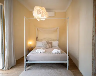 Letto o letti in una camera di Ai due Mori Apt by Addler House Ospitality
