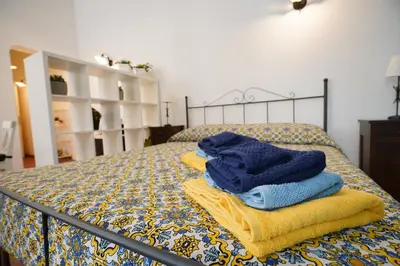 Letto o letti in una camera di Casa Fabio