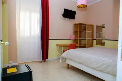 Letto o letti in una camera di MOKARTA B&B