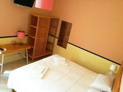 Letto o letti in una camera di MOKARTA B&B