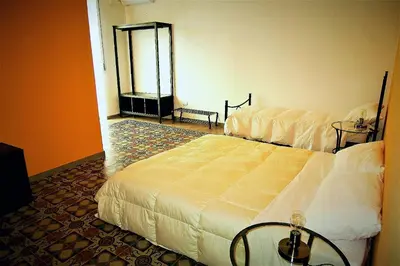 Letto o letti in una camera di MOKARTA B&B
