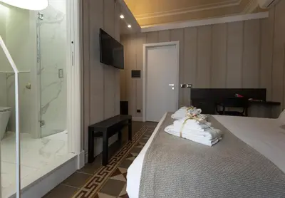 Letto o letti in una camera di B&B Palazzo Perrotta
