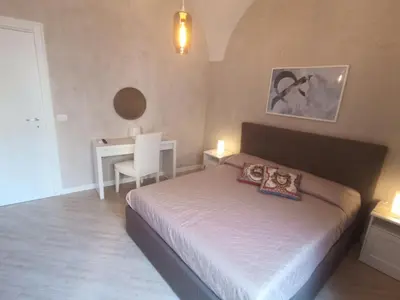 Letto o letti in una camera di Cortile Pantaleone Holiday Home