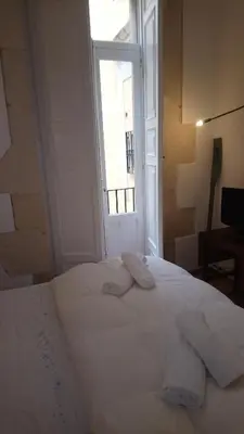 Letto o letti in una camera di L'Acanto