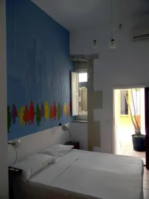 Letto o letti in una camera di L'Acanto
