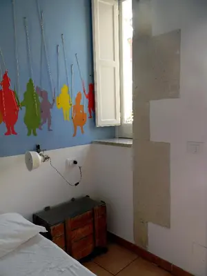 Letto o letti in una camera di L'Acanto