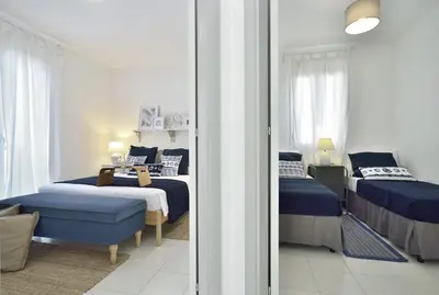 Letto o letti in una camera di Casa Blanca a due passi dal mare