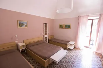 Letto o letti in una camera di 3D House Catania centro