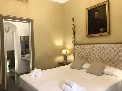 Letto o letti in una camera di Casa Modica - Luxury rooms