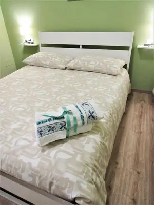 Letto o letti in una camera di B&B le camere di SALLY