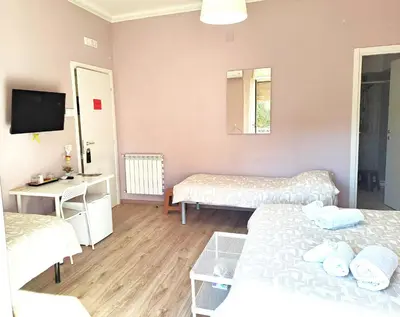 Letto o letti in una camera di B&B le camere di SALLY