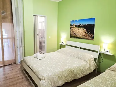 Letto o letti in una camera di B&B le camere di SALLY