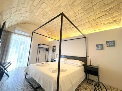 Letto o letti in una camera di Moronero