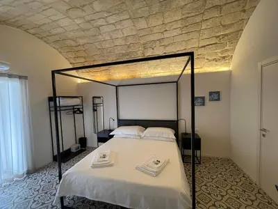 Letto o letti in una camera di Moronero