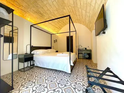 Letto o letti in una camera di Moronero