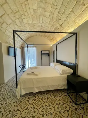 Letto o letti in una camera di Moronero