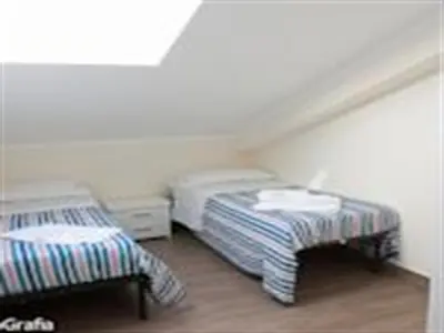 Letto o letti in una camera di Residence Fronte Mare