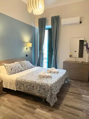 Letto o letti in una camera di Casa tua suites