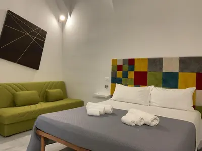 Area soggiorno di Rossaroll Holiday Houses