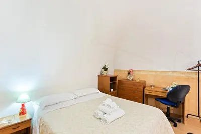 Letto o letti in una camera di GuestHost - Castello Ursino Balcony Apartment x5