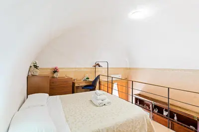 Letto o letti in una camera di GuestHost - Castello Ursino Balcony Apartment x5