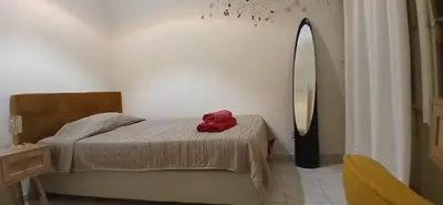 Letto o letti in una camera di The Good Place
