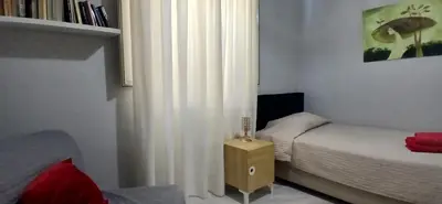 Letto o letti in una camera di The Good Place