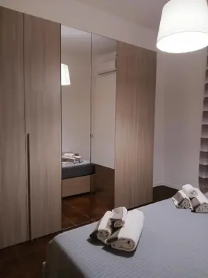 Letto o letti in una camera di Santa Chiara Home Siracusa