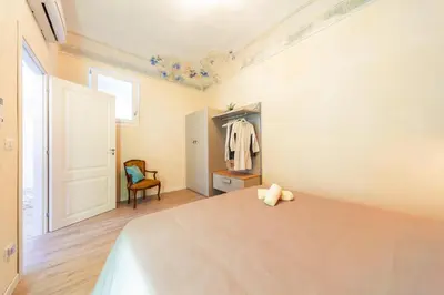 Letto o letti in una camera di GuestHost - Ortigia Promenade
