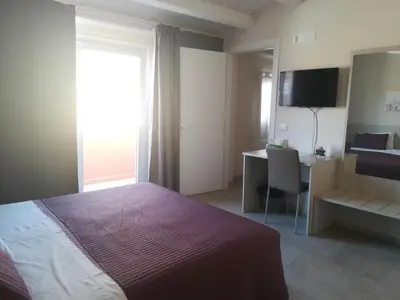 Letto o letti in una camera di Casa Vacanze Bella Giulia