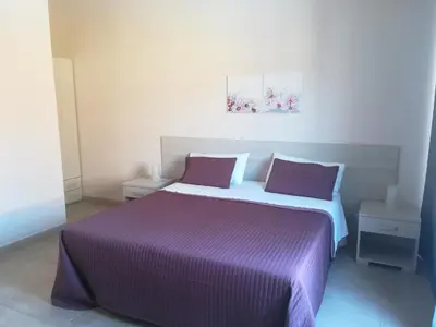 Letto o letti in una camera di Casa Vacanze Bella Giulia