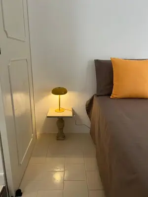 Letto o letti in una camera di FICU PALACE