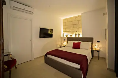Letto o letti in una camera di La Dimora degli Eroi
