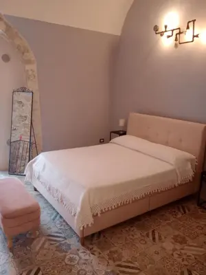 Letto o letti in una camera di Suite Vaniglia