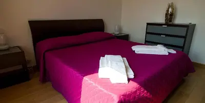 Letto o letti in una camera di Villa Calabernardo