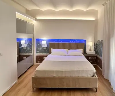 Letto o letti in una camera di Casa vacanza Apollodoro