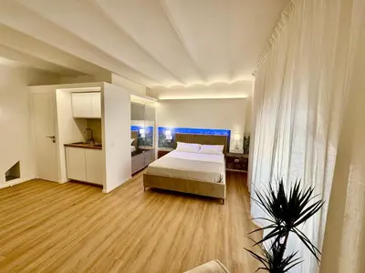 Letto o letti in una camera di Casa vacanza Apollodoro