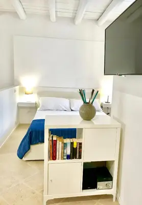 Letto o letti in una camera di Casa vacanza Apollodoro