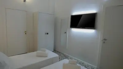 Letto o letti in una camera di Regina Margherita
