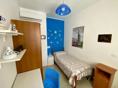 Letto o letti in una camera di VIVIHOLIDAY